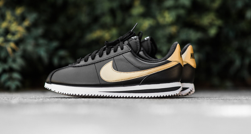 nike cortez black and gold mens