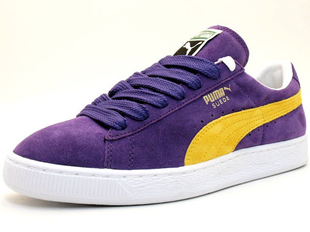 purple and yellow puma suedes