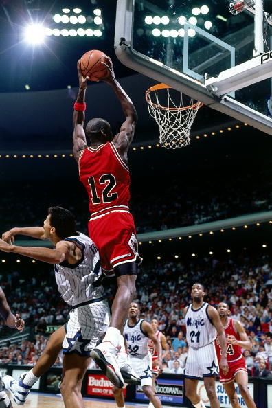 Ever wonder why Michael Jordan once had to wear a nameless, No. 12