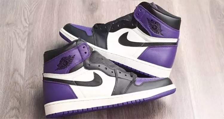 black and purple jordan 1s