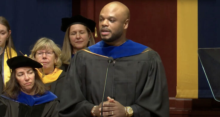 KeJuan Wilkins delivering commencement speech at University of Michigan